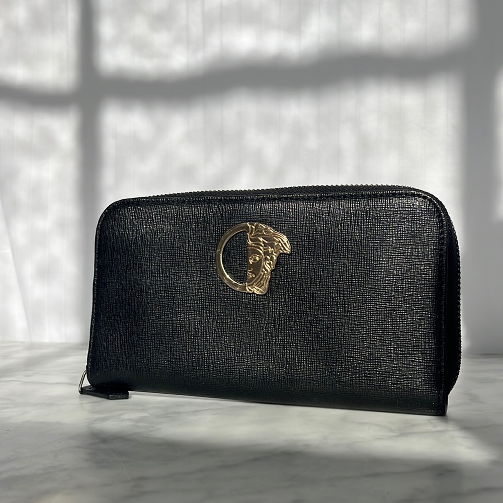Versace full size black zip wallet.